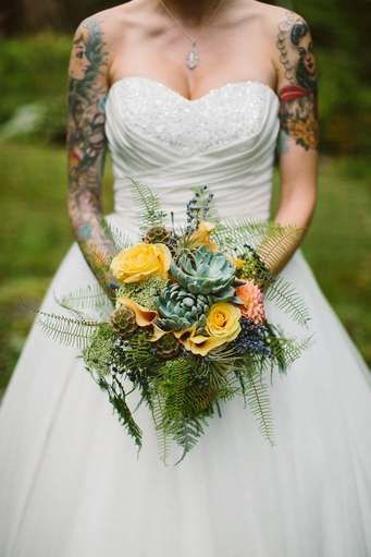 Best wedding dresses for tattooed brides - how to choose a dress