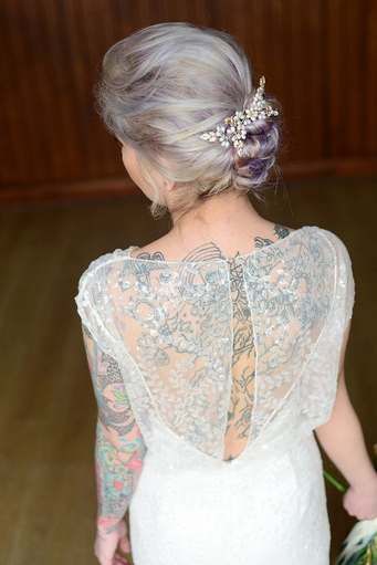Amazing brides with back tattoos